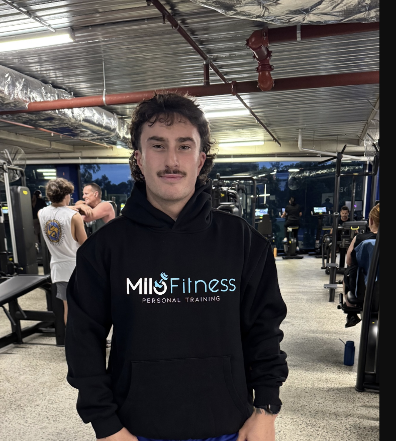 A client of Alex Milo wearing the MiloFitness hoodie